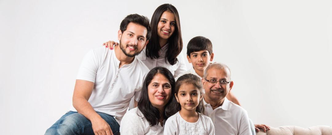 Family-Focused Support: Family sitting together representing VProtect's family-focused assistance